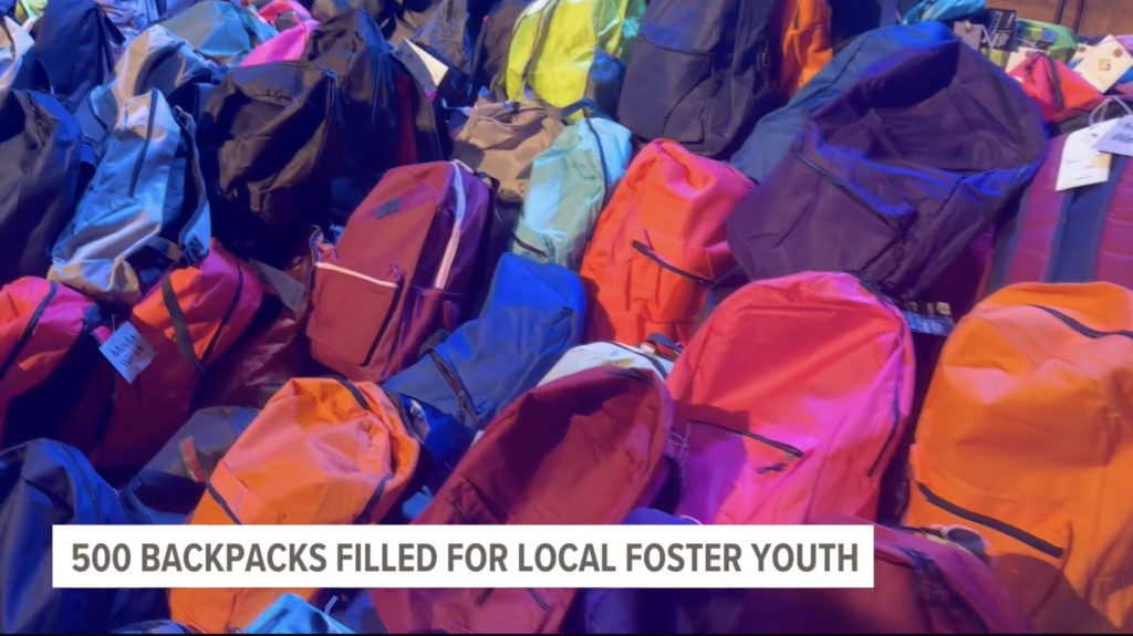500 Backpacks Filled For Local Youth in Foster Care with Comfort Cases